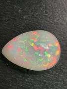 NATURAL OPAL - 10.02 CARATS PEAR CABOCHON CUT