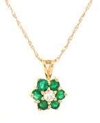 14kt Yellow gold emerald and diamond flower pendant on chain