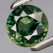 Simply gorgeous! VS grade .69ct yellow green Sapphire solitaire!