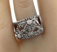 14kt White gold 0.55ctw black and white diamond floral wide ring