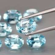 Glittering set of 8 full fire sky blue Topaz! 12.36 carats!