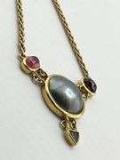 18KT Yellow Gold Center Round Gray Pearl Flanked By Two Oval Pink Tourmaline And Blue Topaz Dangling
