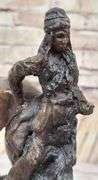 Chief Riding Horse on a Rock Bronze Sculpture