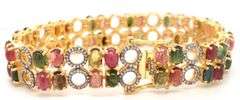 Heart Throbbing 18.00CTW Oval Shaped Faceted Multi-colored tourmaline & 3.00CTW  Diamond Bracelet in