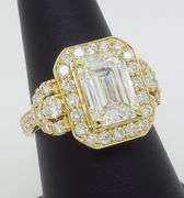 4.59CTW Emerald Cut Halo Diamond Ring in Yellow Gold