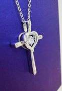 Beautiful cross with heart center Moissanite pendant in sterling silver