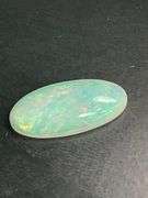 NATURAL OPAL- LOOSE- 17.54 CARAT. OVAL CABOCHON CUT