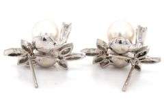 14kt White gold double pearl and diamond accent flower style earrings