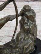 A Man With Bow Bronze Sculpture