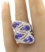 18kt White gold 10ctw Tanzanite and 2.85ctw diamond halo ring