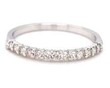 14kt White gold 0.23ctw shared prong diamond band