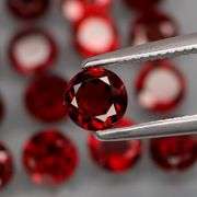 Premium 7.32ct round cut cherry red Mozambique Garnet set!