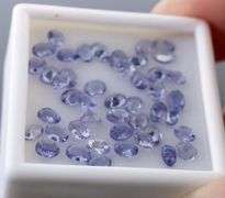 Heavy flashing! Untreated! 7.11ct oval cut Tanzanite set