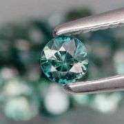 Heated only! 3.60ct blue green Sapphire set!