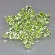 Dazzling 4.70ct untreated super clean apple green Peridot set