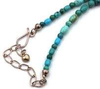 Turquoise beaded necklace with silver clasp