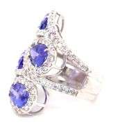 18kt White gold 10ctw Tanzanite and 2.85ctw diamond halo ring