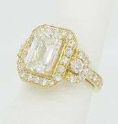 4.59CTW Emerald Cut Halo Diamond Ring in Yellow Gold