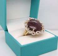 Glittering Huge 34.17CTS Round Cabochon-Cut Ruby & 1.41CTW Round Faceted Colorless Sapphire Ring in 