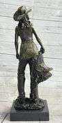 Hot Cast Cowgirl with Saddle Bronze Sculpture