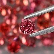 Exquisite 3.06ct set of rare pink Malaya Garnets