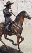 Horse and Cowboy Bronze Sculpture