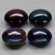 Silky black 3.35ct 4 piece Opal cabochon set!