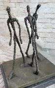 Three Walking Man Bronze Sculpture