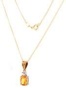 18kt Yellow gold 1.65ct oval yellow sapphire and diamond accent pendant on chain