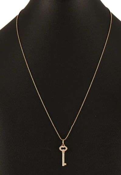 Tiffany & Co. 0.15ctw Diamond Vintage Oval Key Pendant Necklace in 18K