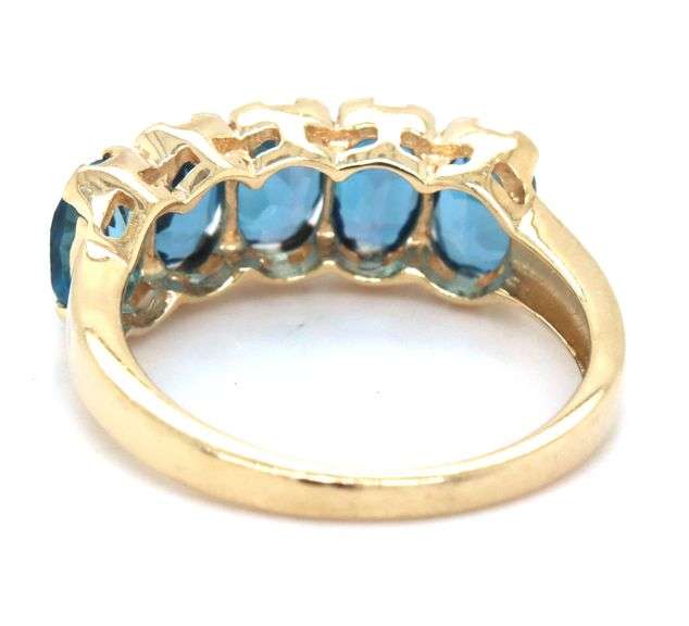 10kt Yellow gold oval blue topaz 5 stone ring
