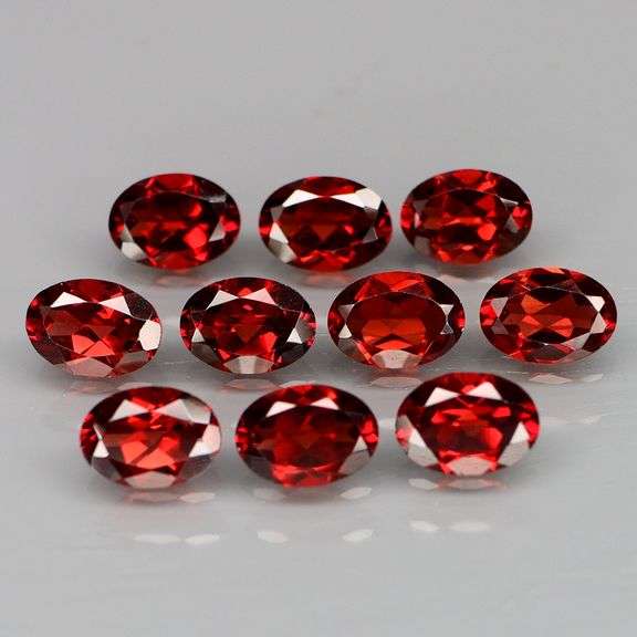 Outstanding color! 9.02ct real pinkish red Garnet set!!