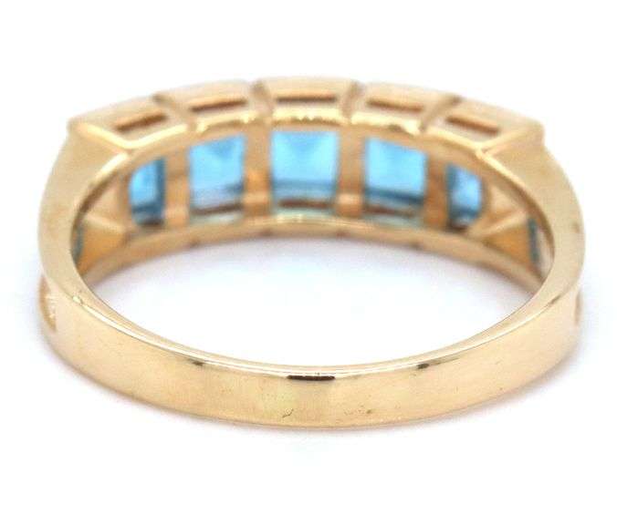14kt Yellow gold channel set princess cut blue topaz five stone band
