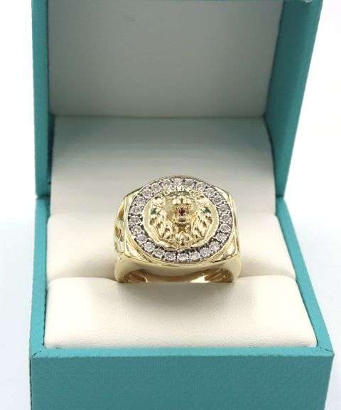 14kt Yellow gold Illusion set diamond halo lion ring with ruby