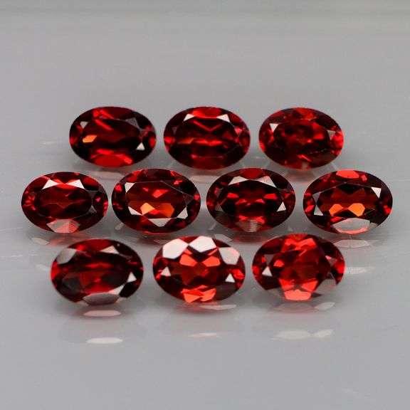 Premium 9.80ct oval cut cherry red Mozambique Garnet set!