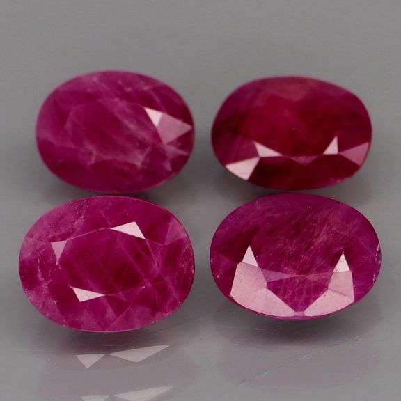 Deep color in this heavy 8.35ct Violet red Ruby set!!!
