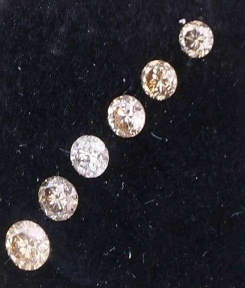 Graduated! 6 piece set of champagne diamonds weighing .44 carats!