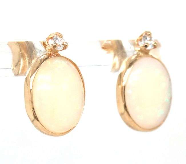 14kt Yellow gold oval Opal and diamond accent earrings