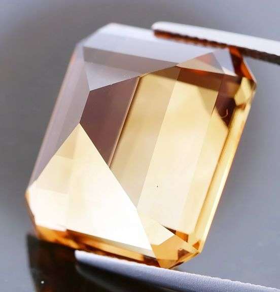 Electric flashing through rich color! Huge 34.99ct Imperial Topaz!