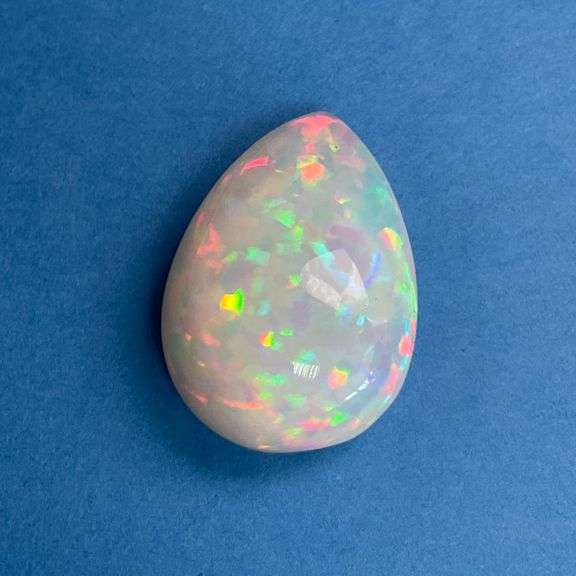 NATURAL OPAL - 14.4 CARATS PEAR CABOCHON CUT