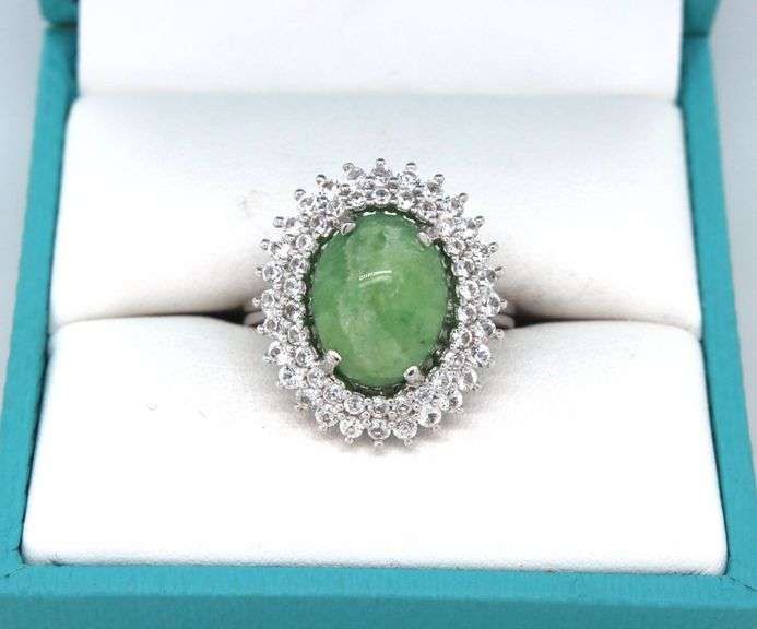 Lovely 6.57CTS Oval Cabochon-Cut Emerald & 1.37CTW White Sapphire ring in sterling silver