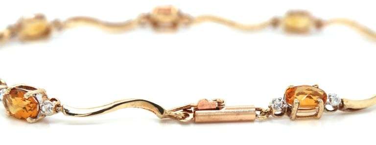 14kt Yellow gold oval citrine woven link station bracelet