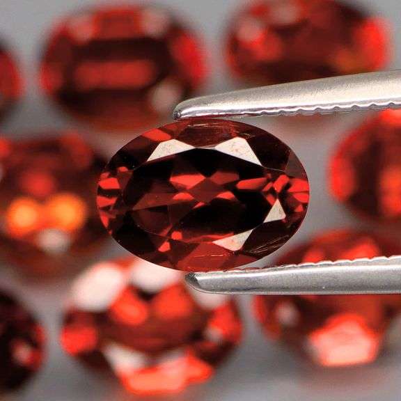 Premium 9.80ct oval cut cherry red Mozambique Garnet set!