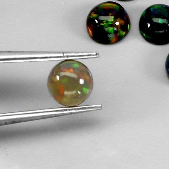 Yita Ridge! 4.15ct Black Opal set with vibrant play of color!