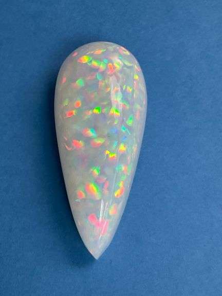 HUGE NATURAL OPAL - 21.05 CARATS PEAR CABOCHON CUT