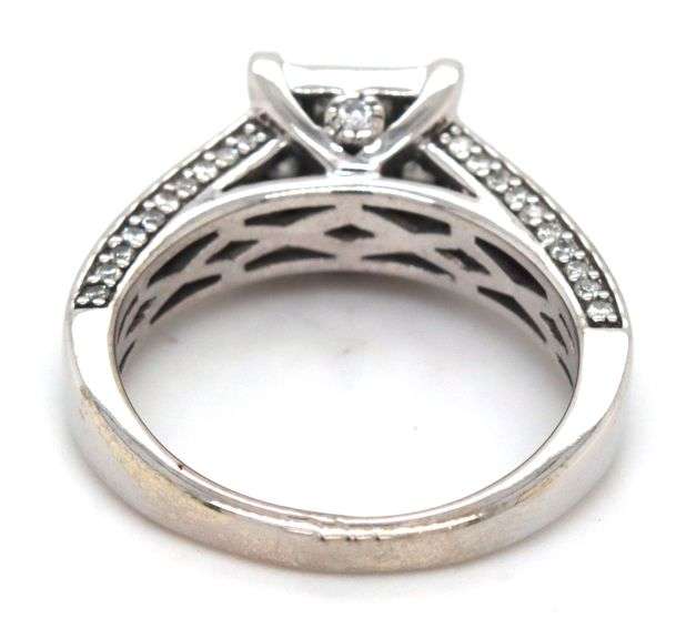 14kt White gold 1.25ctw Invisible set princess cut and round diamond engagement ring
