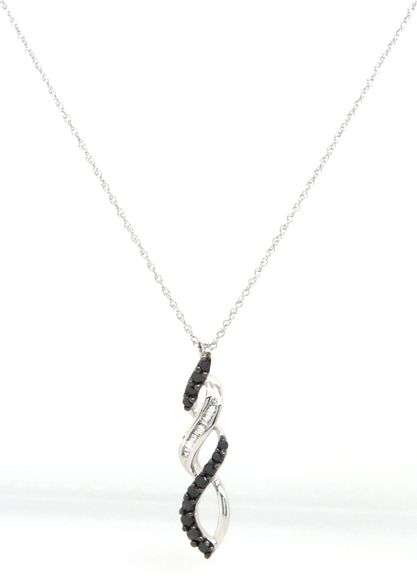 10kt White gold black and white diamond twisted pendant on chain