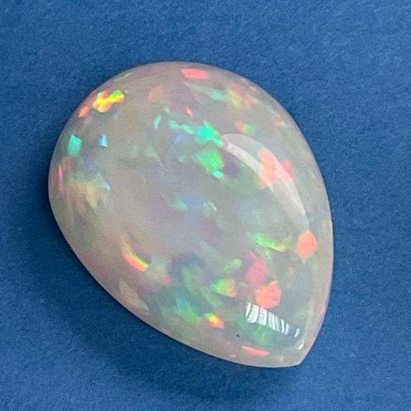 NATURAL OPAL - 14.4 CARATS PEAR CABOCHON CUT