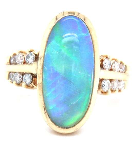 14kt Yellow gold doublet oval opal and diamond ring