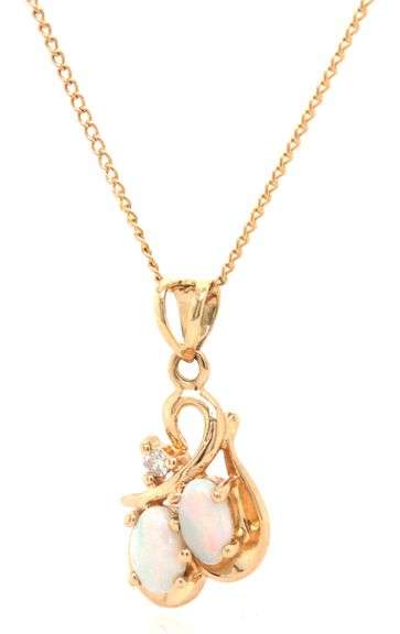14kt Yellow gold double oval Opal and diamond pendant on chain